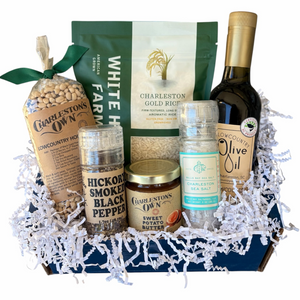 Charleston Gourmet Gift Box with White House Farms Charleston Gold Rice, Charleston's Own Hoppin' John Peas, Lowcountry Olive Oil, Hickory Smoked Black Pepper, Bulls Bay Sea Salt, and Charleston's Own Sweet Potato Butter packed in a branded blue gift box