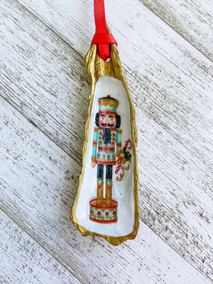 Nutcracker Oyster Shell Ornament: Blue with Candy Cane - Essentially Charleston