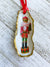 Nutcracker Oyster Shell Ornament: Blue with Candy Cane - Essentially Charleston