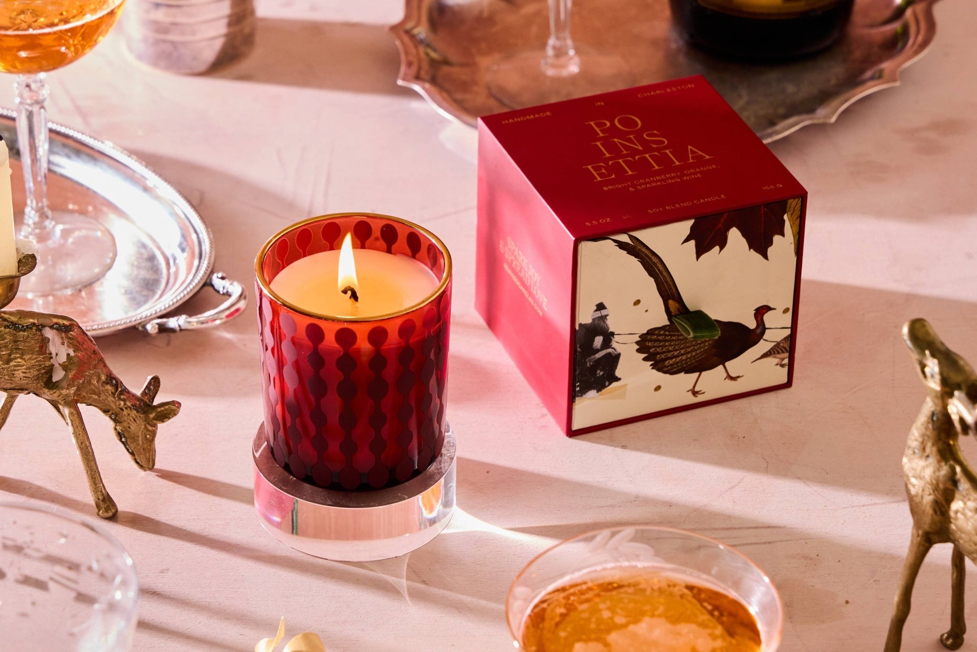 Rewined Poinsettia Holiday Candle 5.5 oz - Essentially Charleston